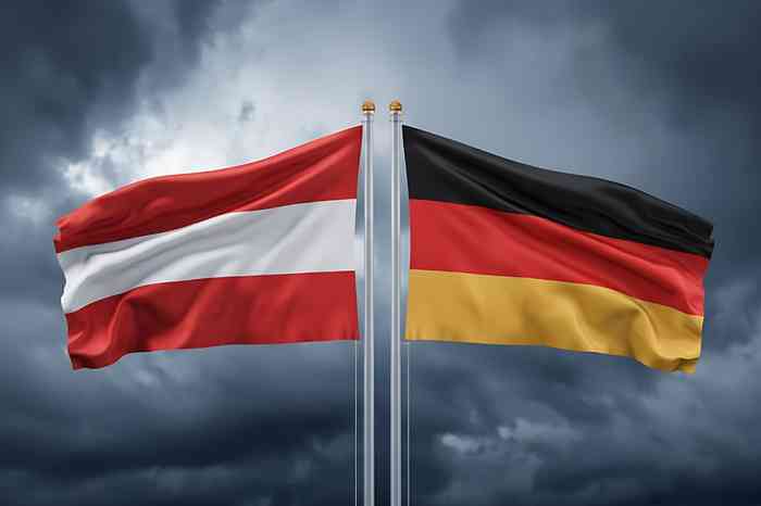 Flaggen von Österreich und Deutschland - © Mamun - stock.adobe.com